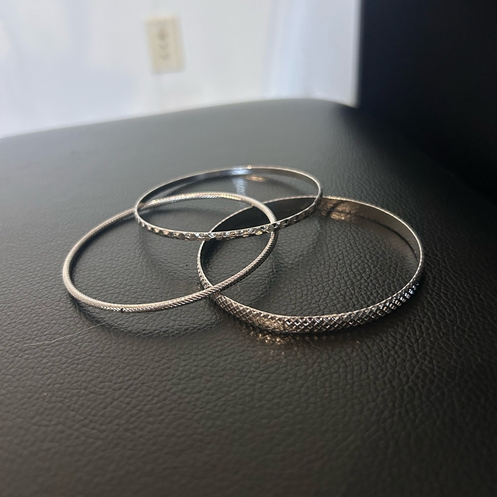 Silver arm cuffs